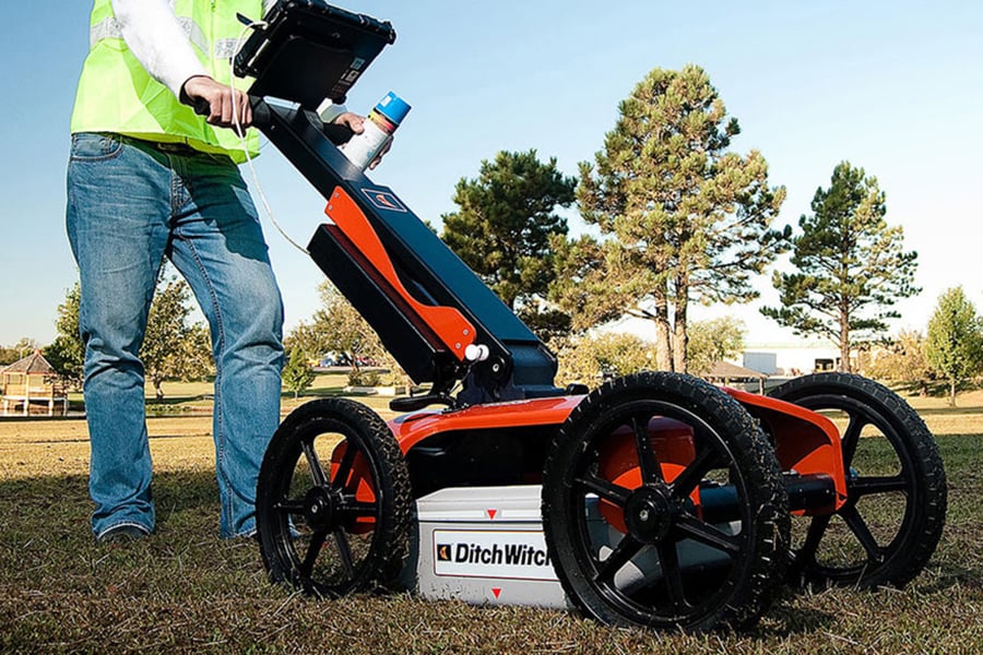 A ground penetrating radar scans a cemetery.